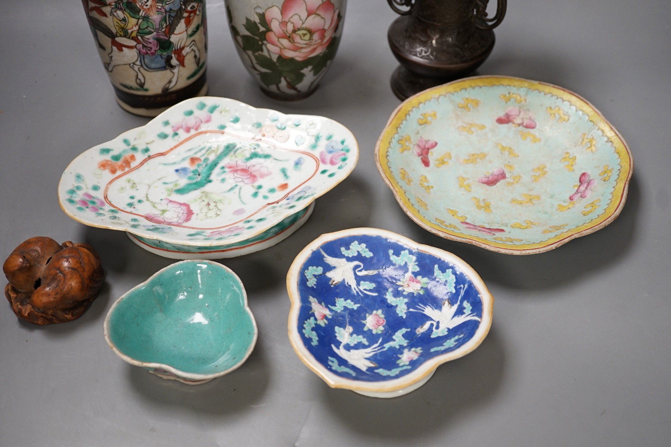A group of 19th century Chinese porcelain dishes and a vase, and a Japanese ‘bird’ carving etc.